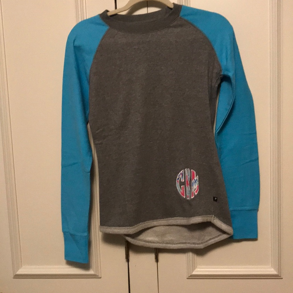 Monogrammed with Lilly pattern gray sweatshirt with turquoise sleeves.